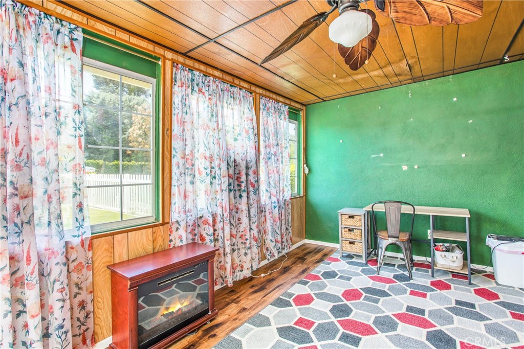 217 Syllmar Circle Calimesa, CA 92320 - Photo 22 of 28 a bedroom with a bed and a window