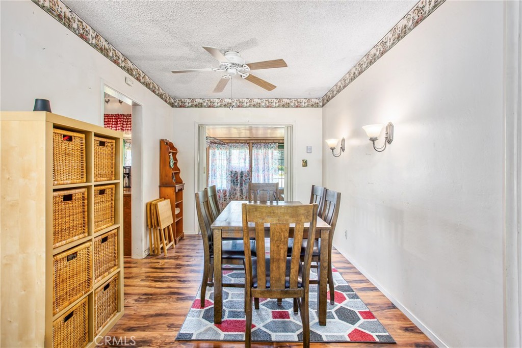 217 Syllmar Circle Calimesa, CA 92320 - Photo 8 of 28 a view of a dining room with furniture