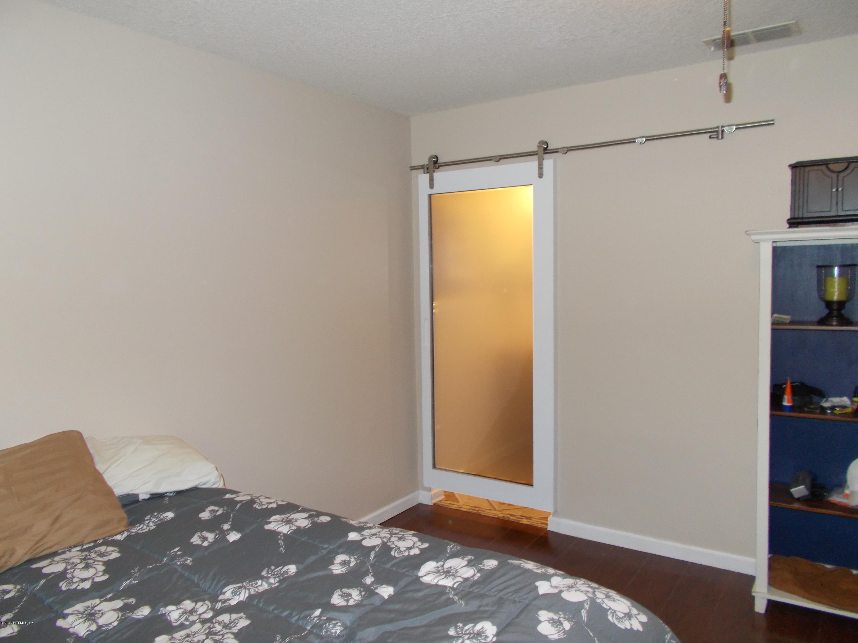 2608 Spring Park Road Jacksonville, FL 32207 - Photo 12 of 24 "BARN DOOR" to Master Bath