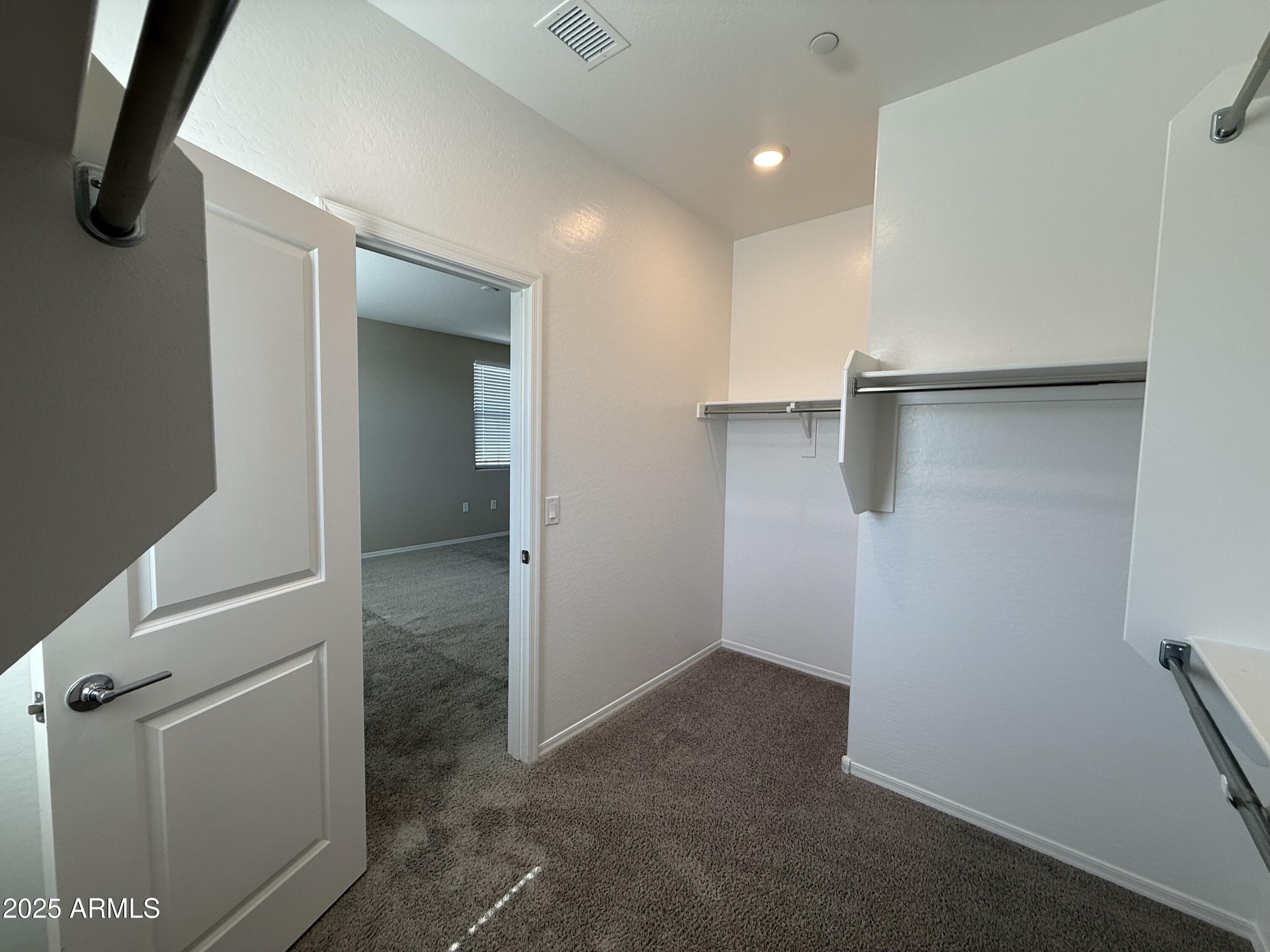 1959 East Hampton Lane, Unit 101 Gilbert, AZ 85295 - Photo 13 of 23 wooden floor in an empty room