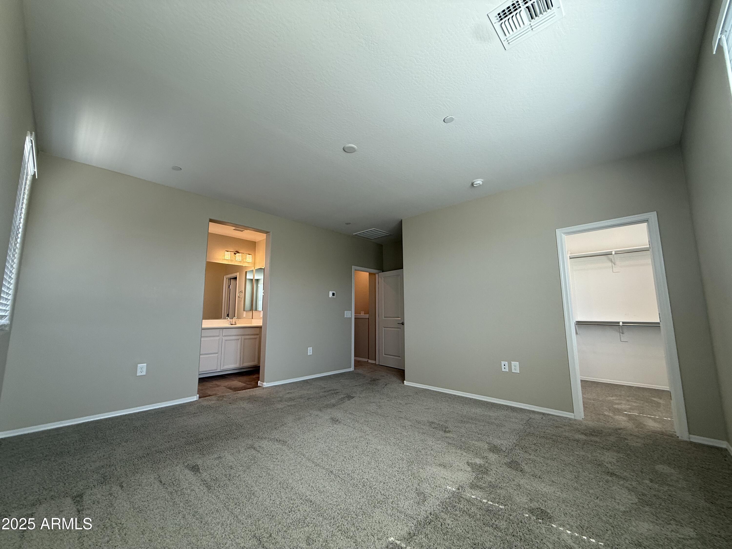 1959 East Hampton Lane, Unit 101 Gilbert, AZ 85295 - Photo 9 of 23 a view of an empty room and a window
