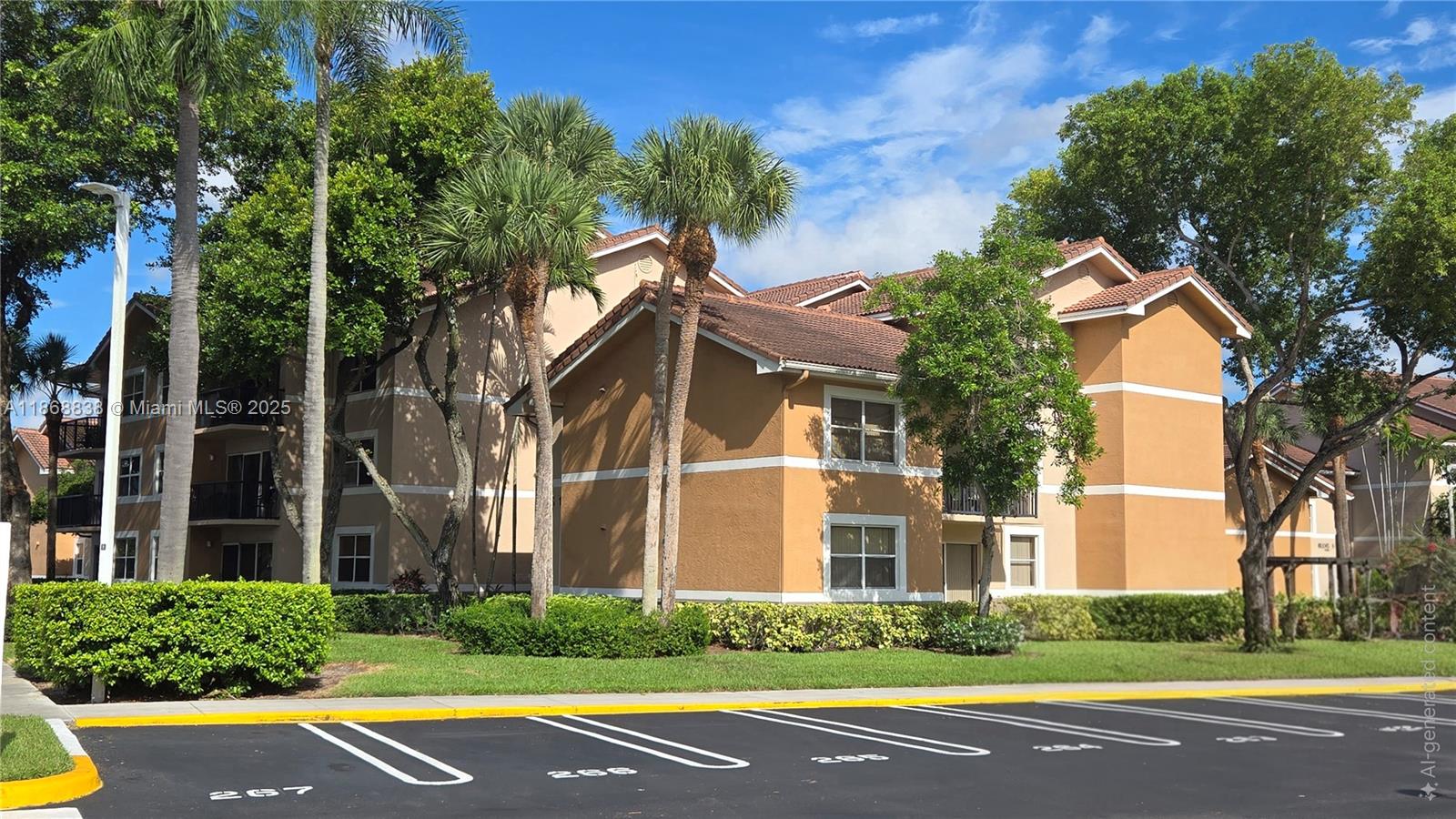 8851 Wiles Road, Unit 103 Coral Springs, FL 33067 - Photo 5 of 23 front view of a house with a yard