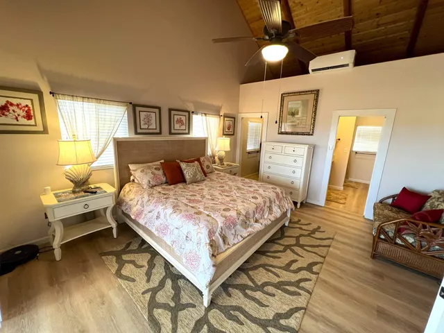 a bathroom with a double vanity sink and mirror