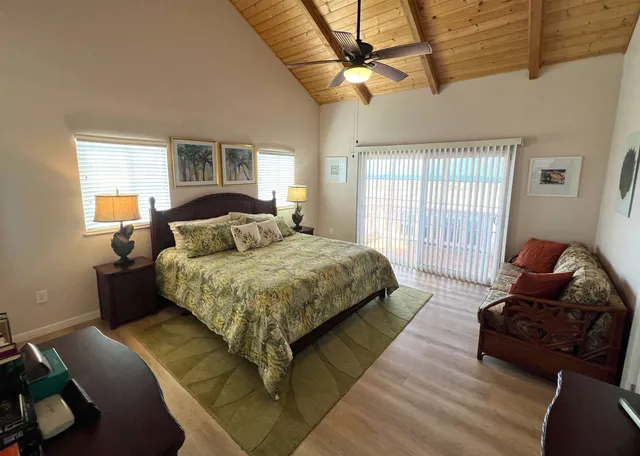 a living room with lots of furniture and a flat screen tv