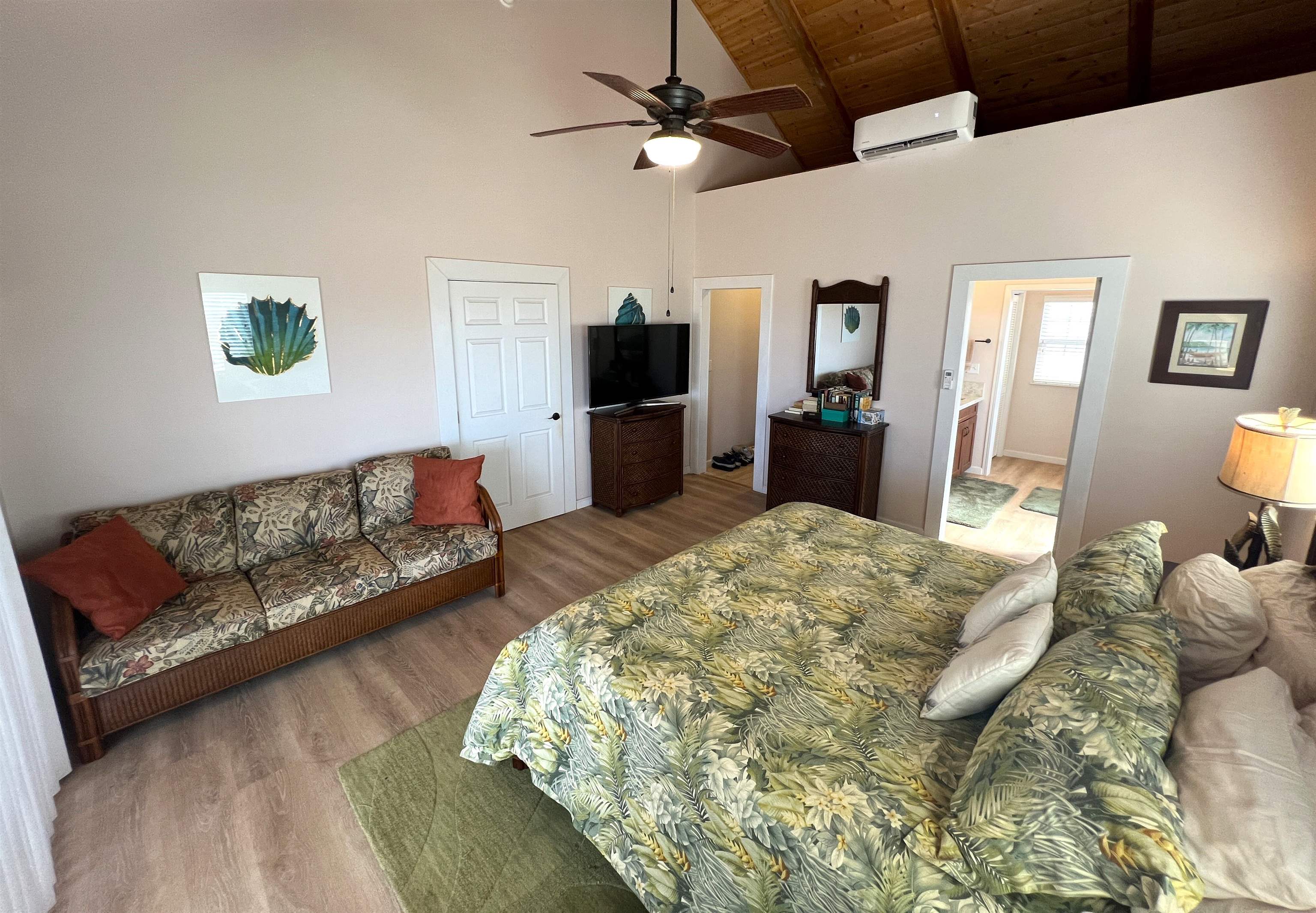 403 Pa Loa Loop, Unit LOT #221 Maunaloa, HI 96770 - Photo 24 of 33 a bedroom with a bed window and couch