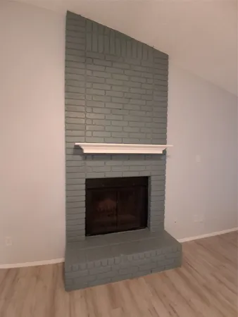 a living room with a fireplace