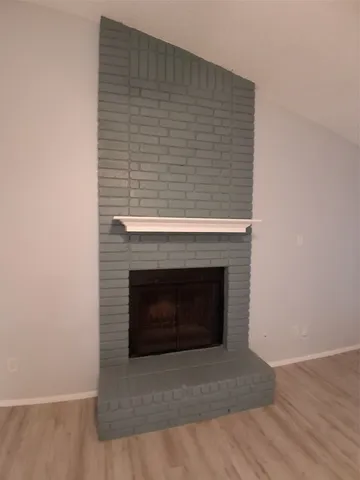 a living room with a fireplace