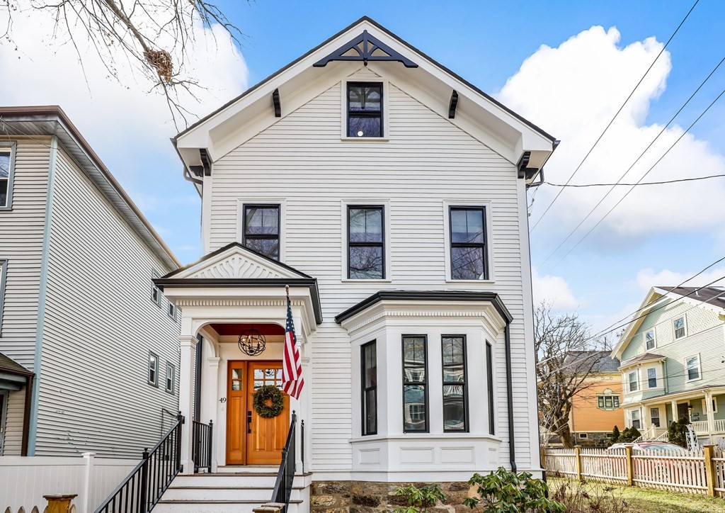 49 Boylston Street Boston, MA 02130 - Photo 1 of 36 a front view of a house with a yard