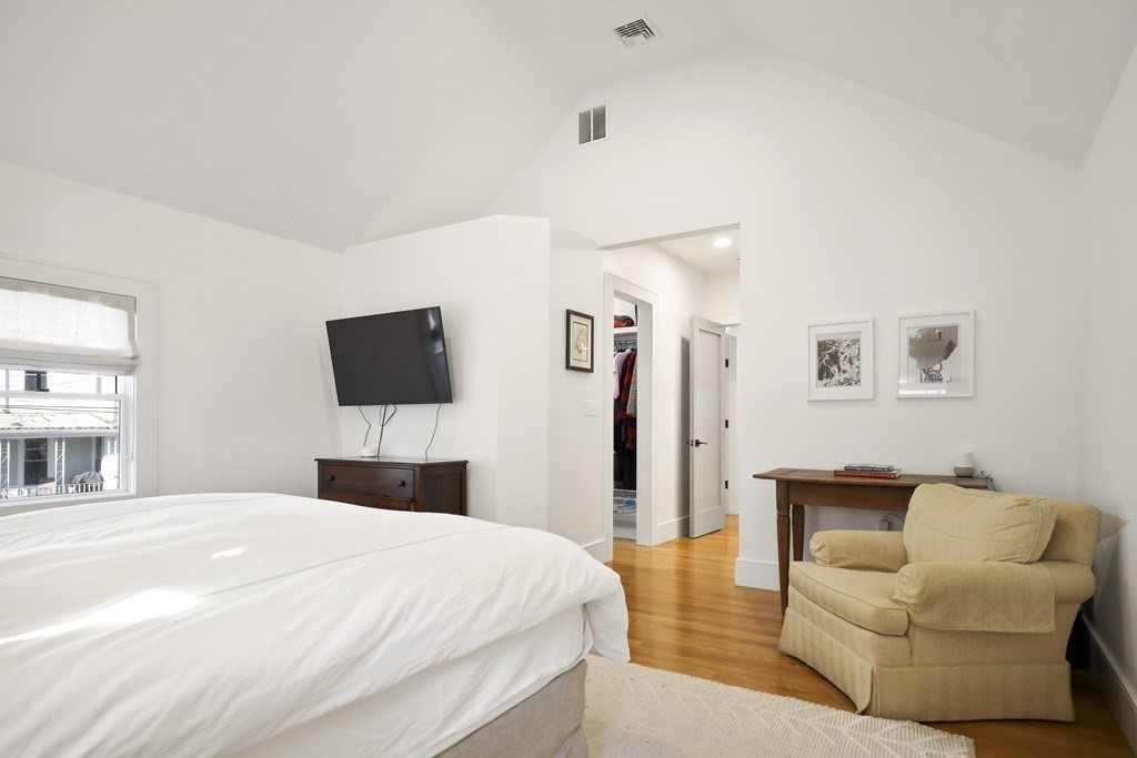 49 Boylston Street Boston, MA 02130 - Photo 12 of 36 a bedroom with a bed and a couch
