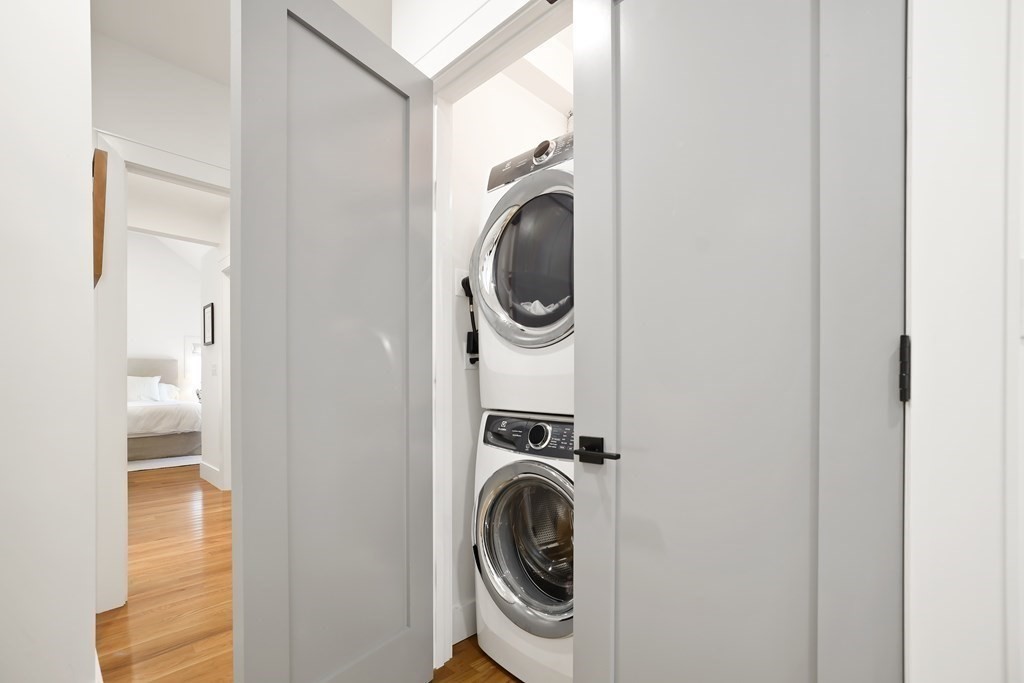 49 Boylston Street Boston, MA 02130 - Photo 17 of 36 a utility room with dryer and washer