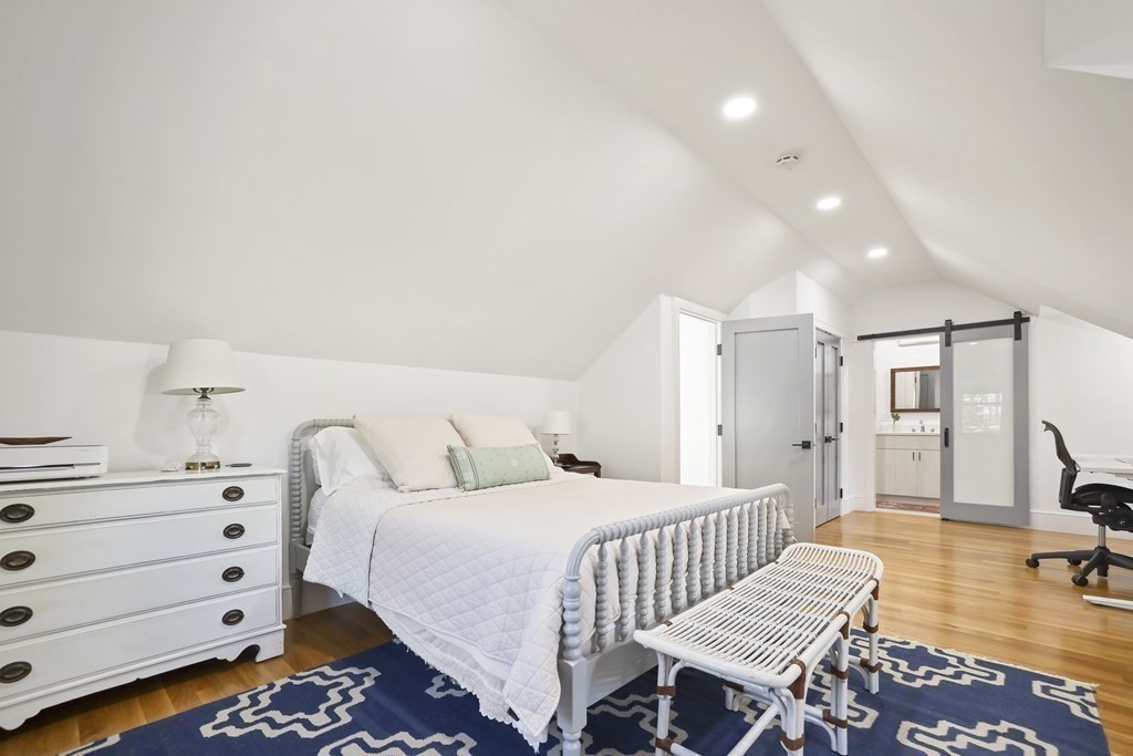 49 Boylston Street Boston, MA 02130 - Photo 23 of 36 a bedroom with a bed and dresser
