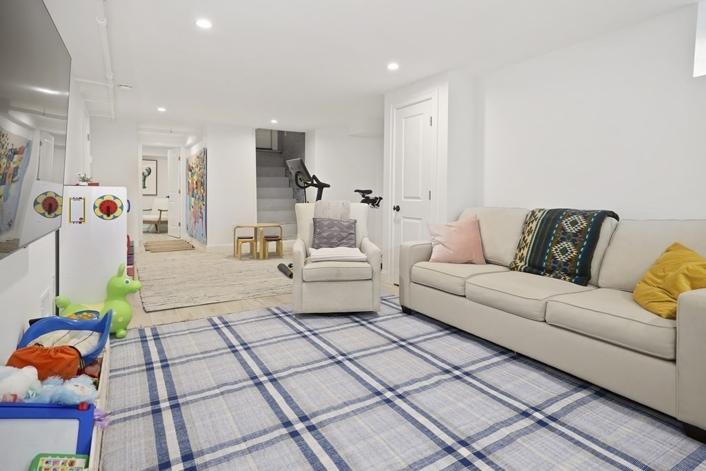 49 Boylston Street Boston, MA 02130 - Photo 27 of 36 a living room with furniture and a couch