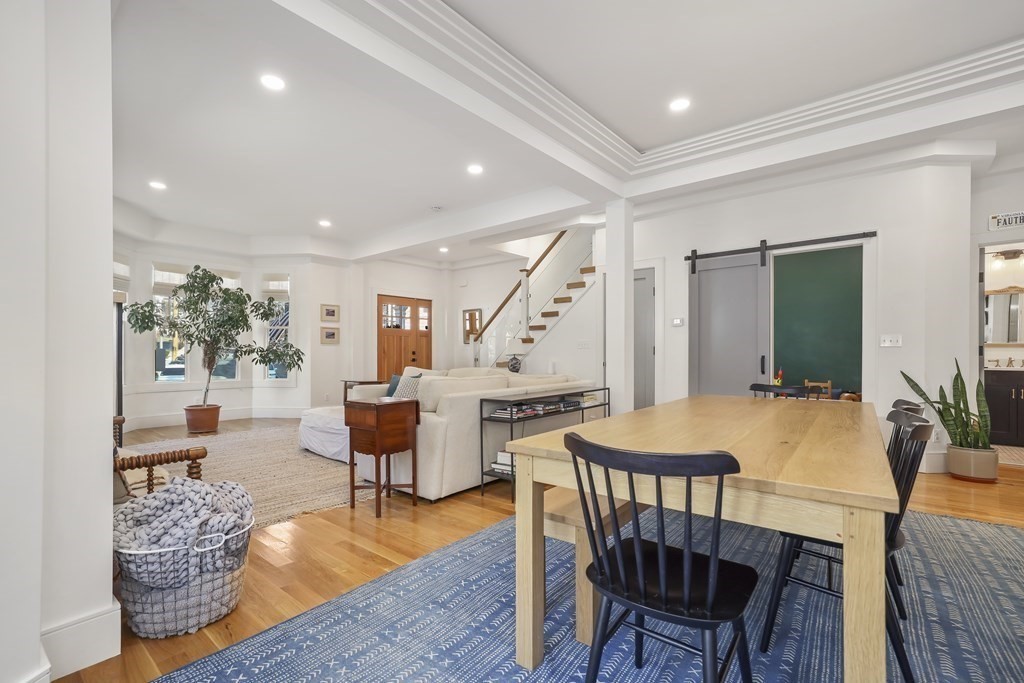 49 Boylston Street Boston, MA 02130 - Photo 3 of 36 a outdoor space with furniture and wooden floor