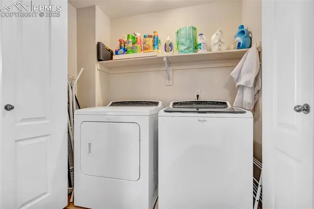 a utility room with dryer and washer