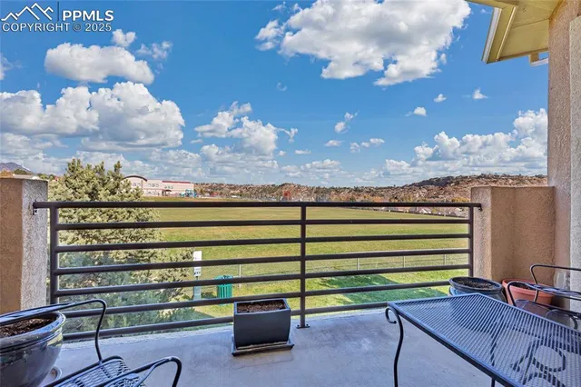 a view of a terrace with sitting area