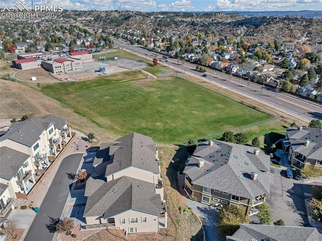 an aerial view of a house with a outdoor space