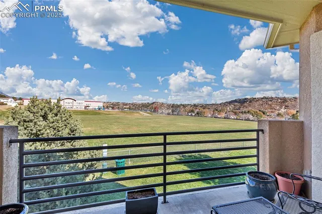 a view of a bench in front of building