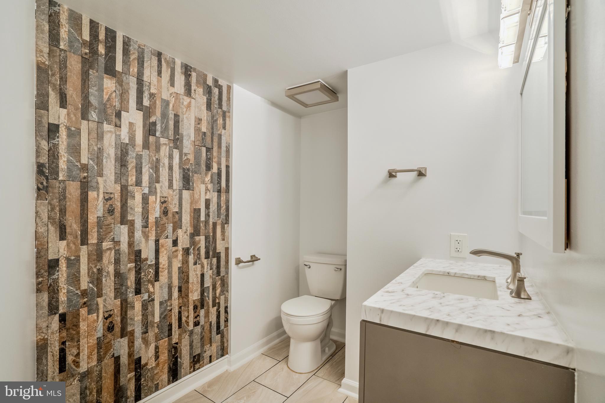 1800 Old Meadow Road, Unit 218 McLean, VA 22102 - Photo 22 of 57 Half Bath on Lower Level