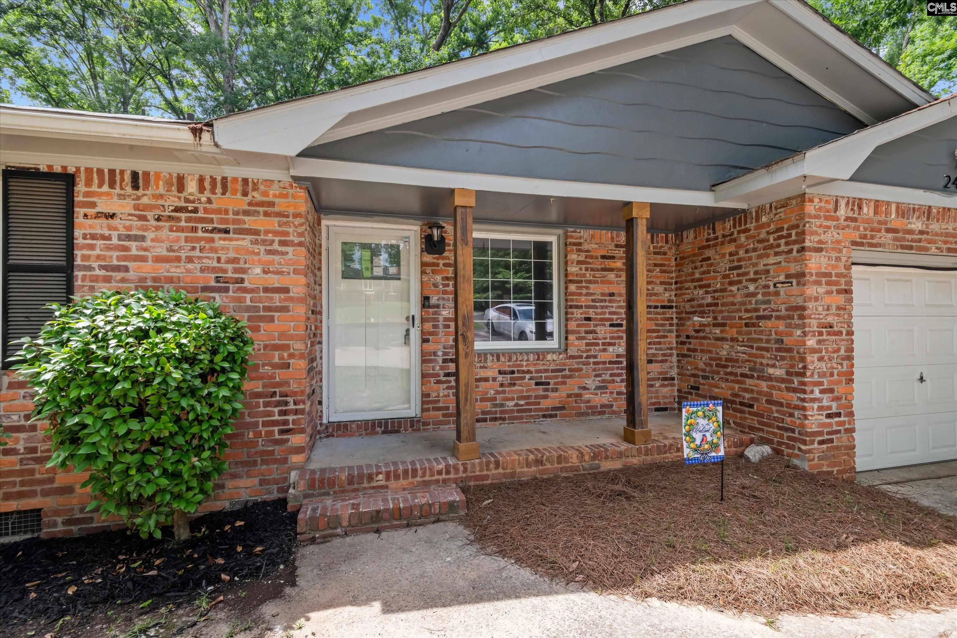 245 Piney Grove Road Columbia, SC 29210 - Photo 2 of 29 a front view of a house with a garden