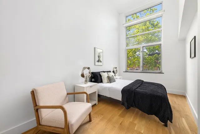 a kitchen with stainless steel appliances a sink and a stove