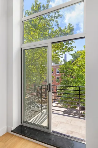 a bathroom with a toilet a sink and bathtub