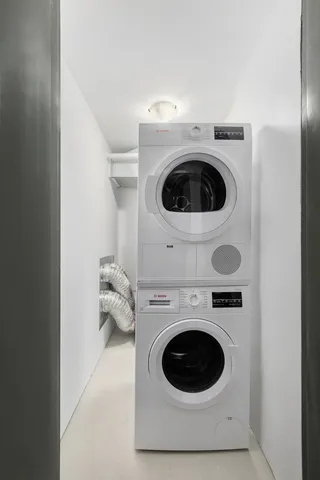 a work place with furniture and rug