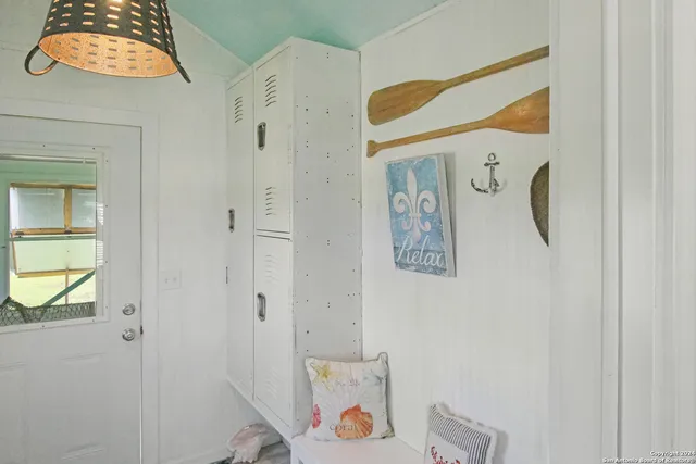 a bathroom with a bathtub and a window