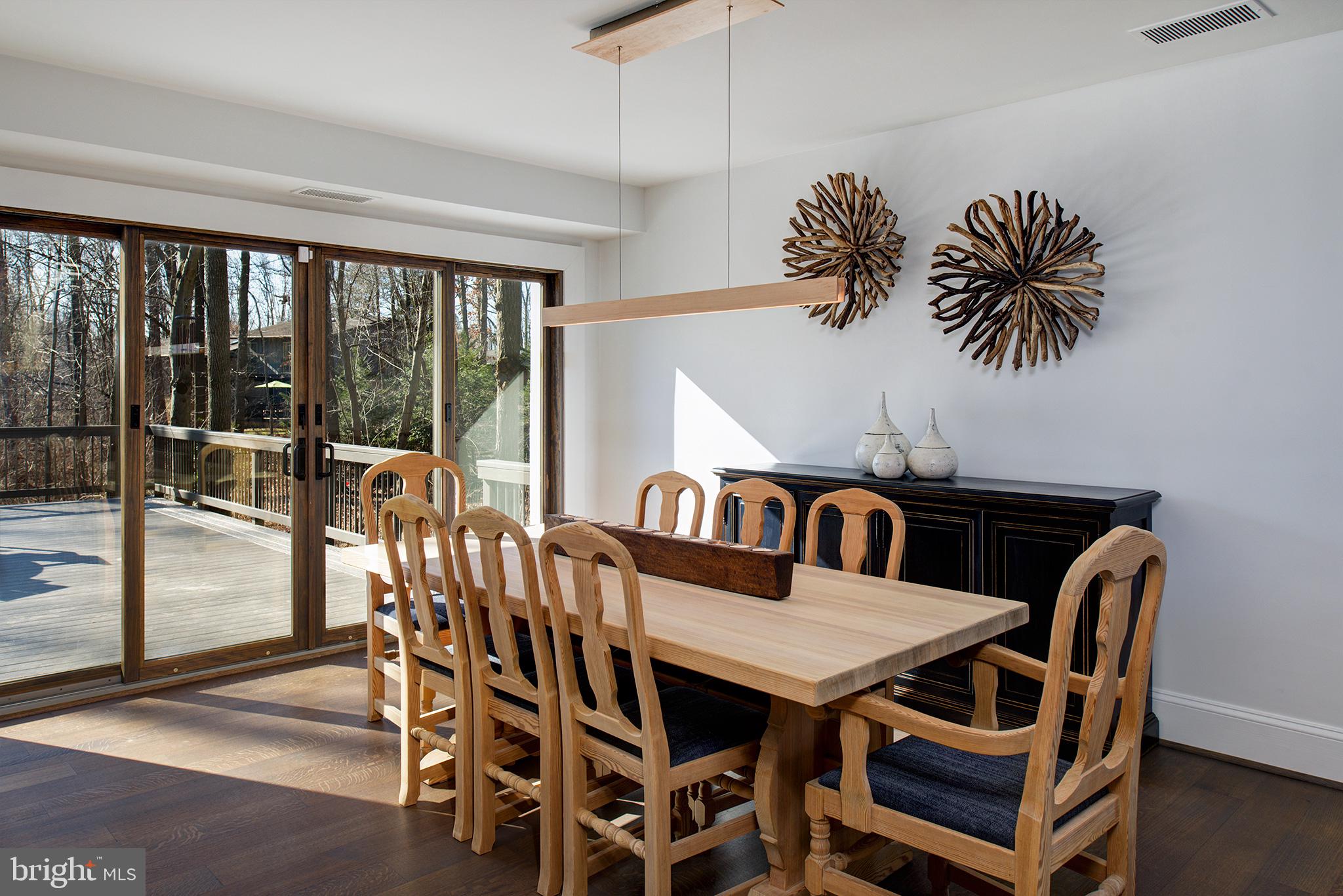 11103 Wedge Drive Reston, VA 20190 - Photo 16 of 41 Formal dining room that opens to serene backyard