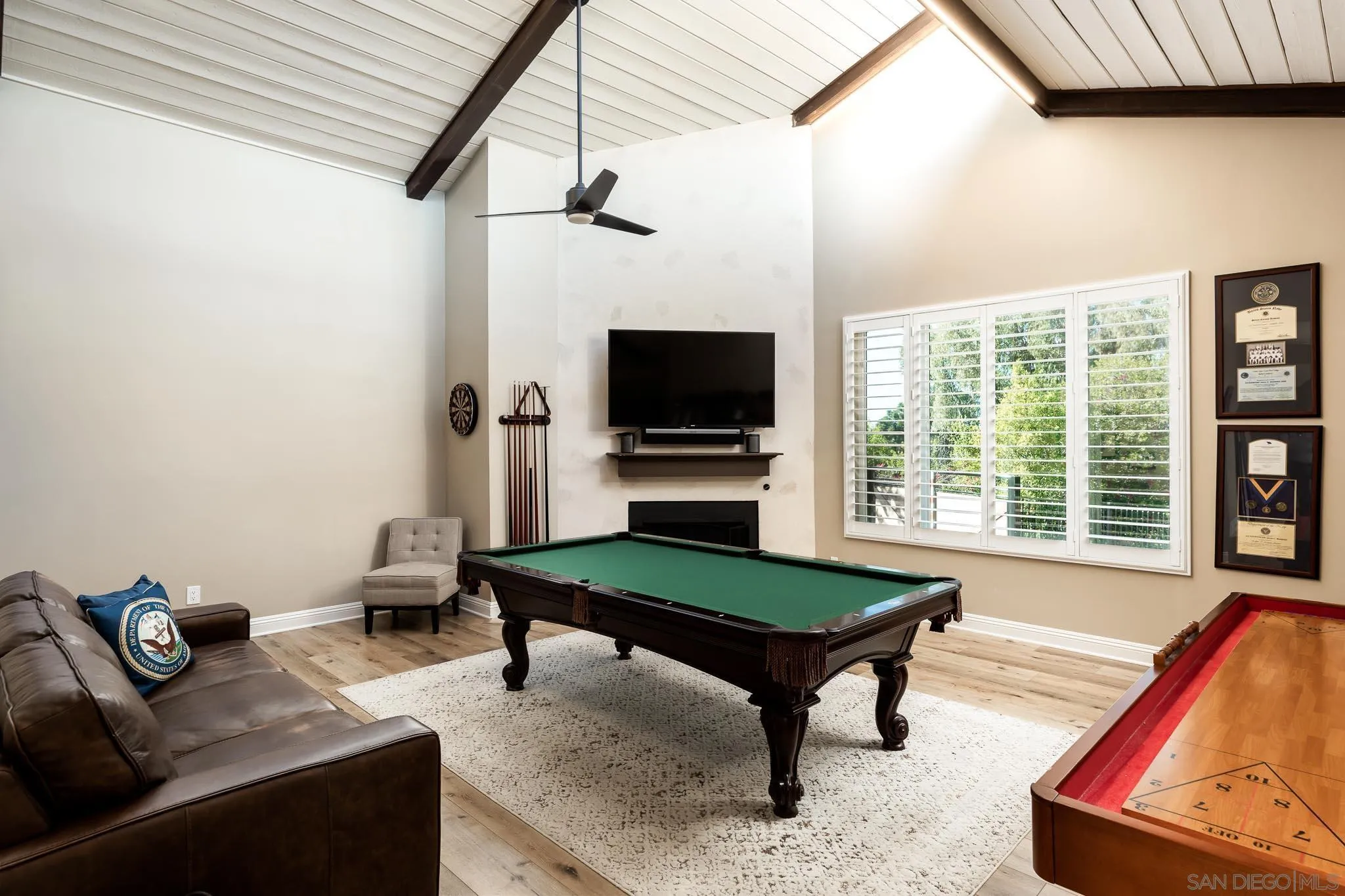 13647 Orchard Gate Road Poway, CA 92064 - Photo 18 of 43 a living room with furniture and a flat screen tv