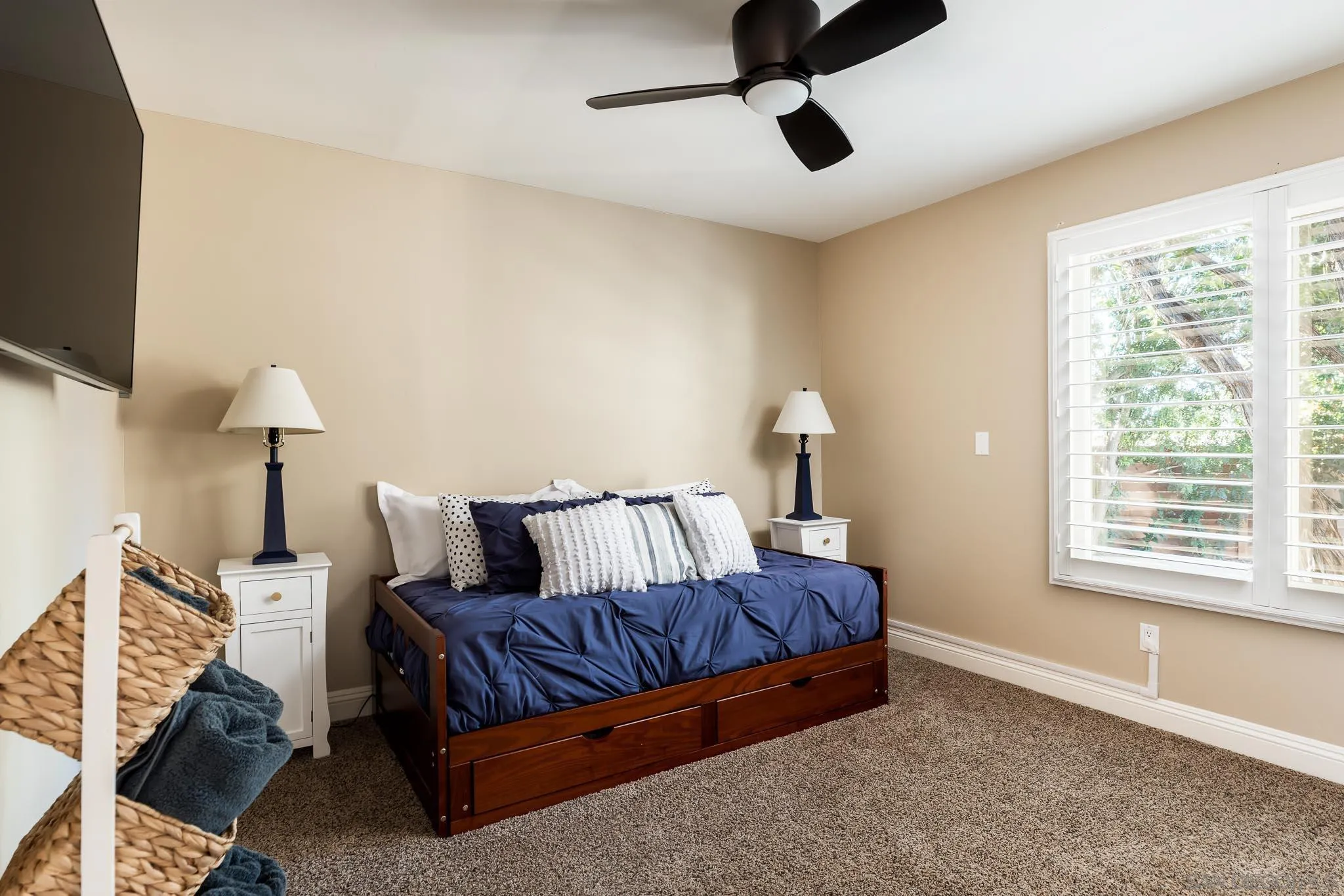 13647 Orchard Gate Road Poway, CA 92064 - Photo 21 of 43 a living room with a bed furniture and a window