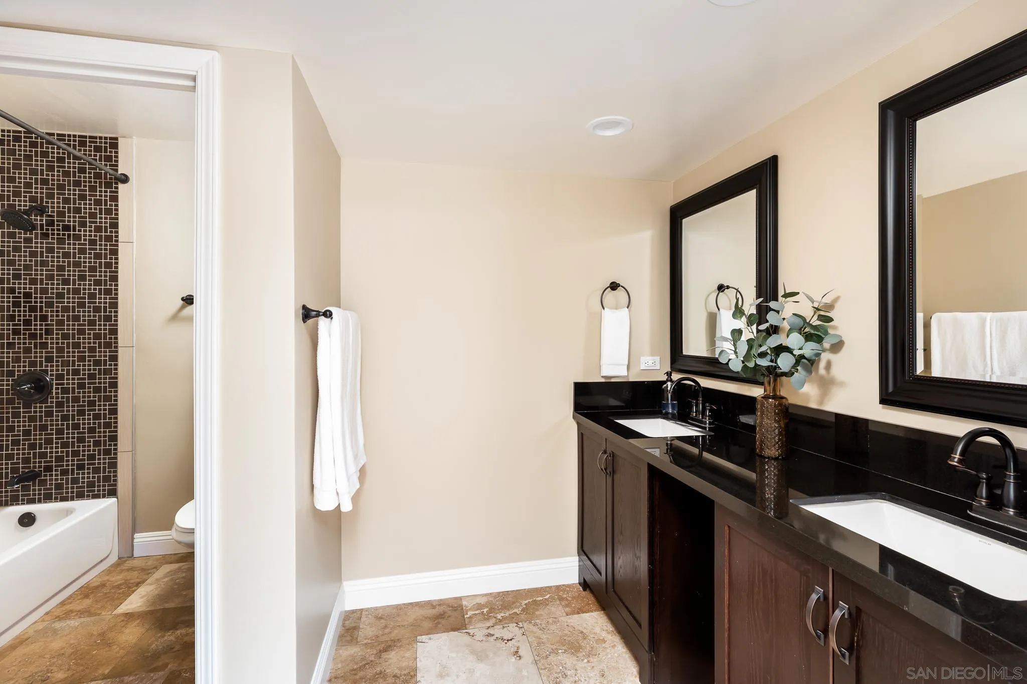 13647 Orchard Gate Road Poway, CA 92064 - Photo 24 of 43 a kitchen with stainless steel appliances granite countertop a sink and a refrigerator