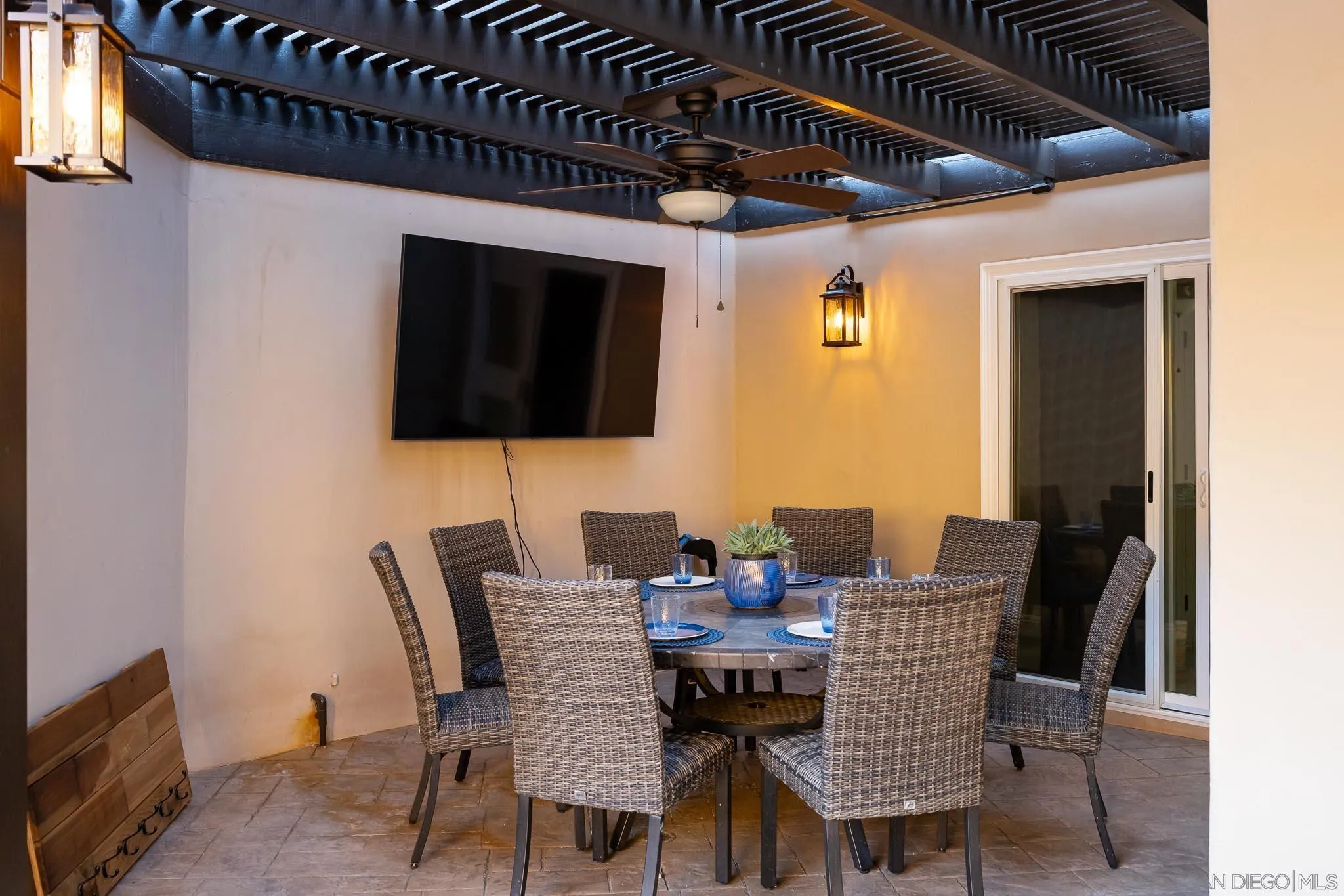 13647 Orchard Gate Road Poway, CA 92064 - Photo 29 of 43 a view of a dining room with furniture and wooden floor