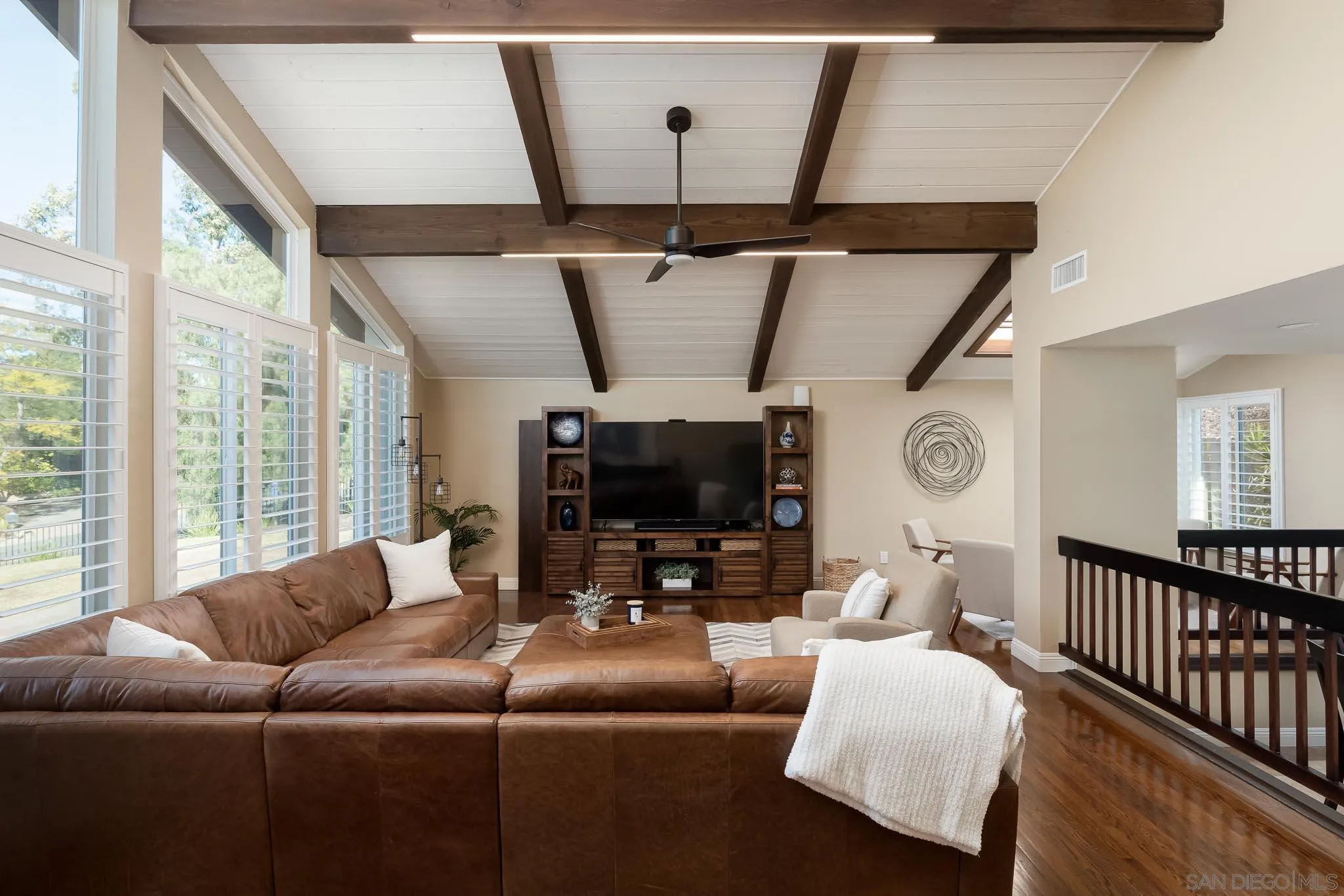 13647 Orchard Gate Road Poway, CA 92064 - Photo 3 of 43 a living room with furniture and a flat screen tv