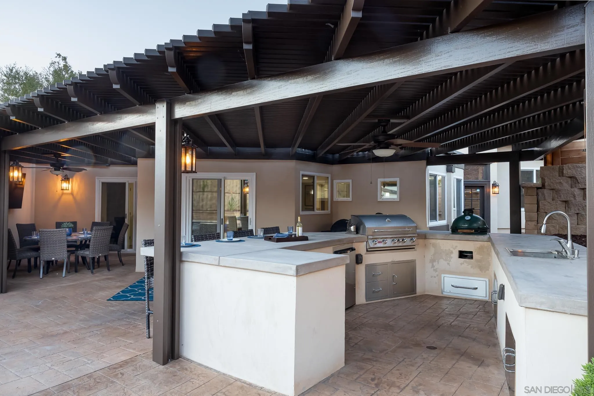13647 Orchard Gate Road Poway, CA 92064 - Photo 34 of 43 a open kitchen with stainless steel appliances granite countertop a sink and cabinets
