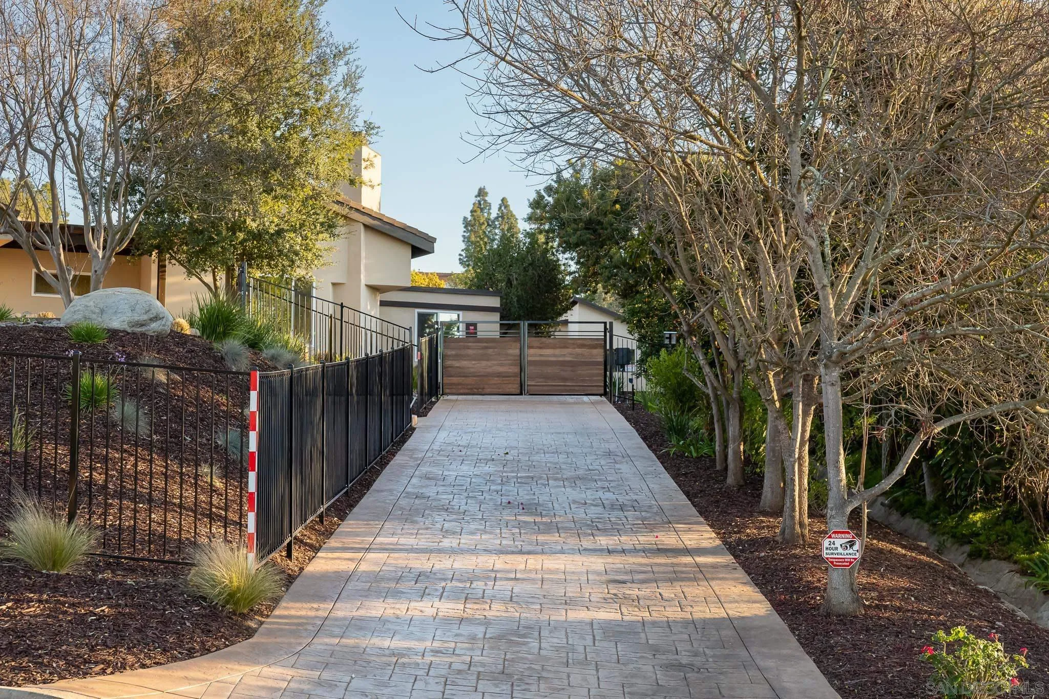 13647 Orchard Gate Road Poway, CA 92064 - Photo 38 of 43 a view of a patio with wooden fence