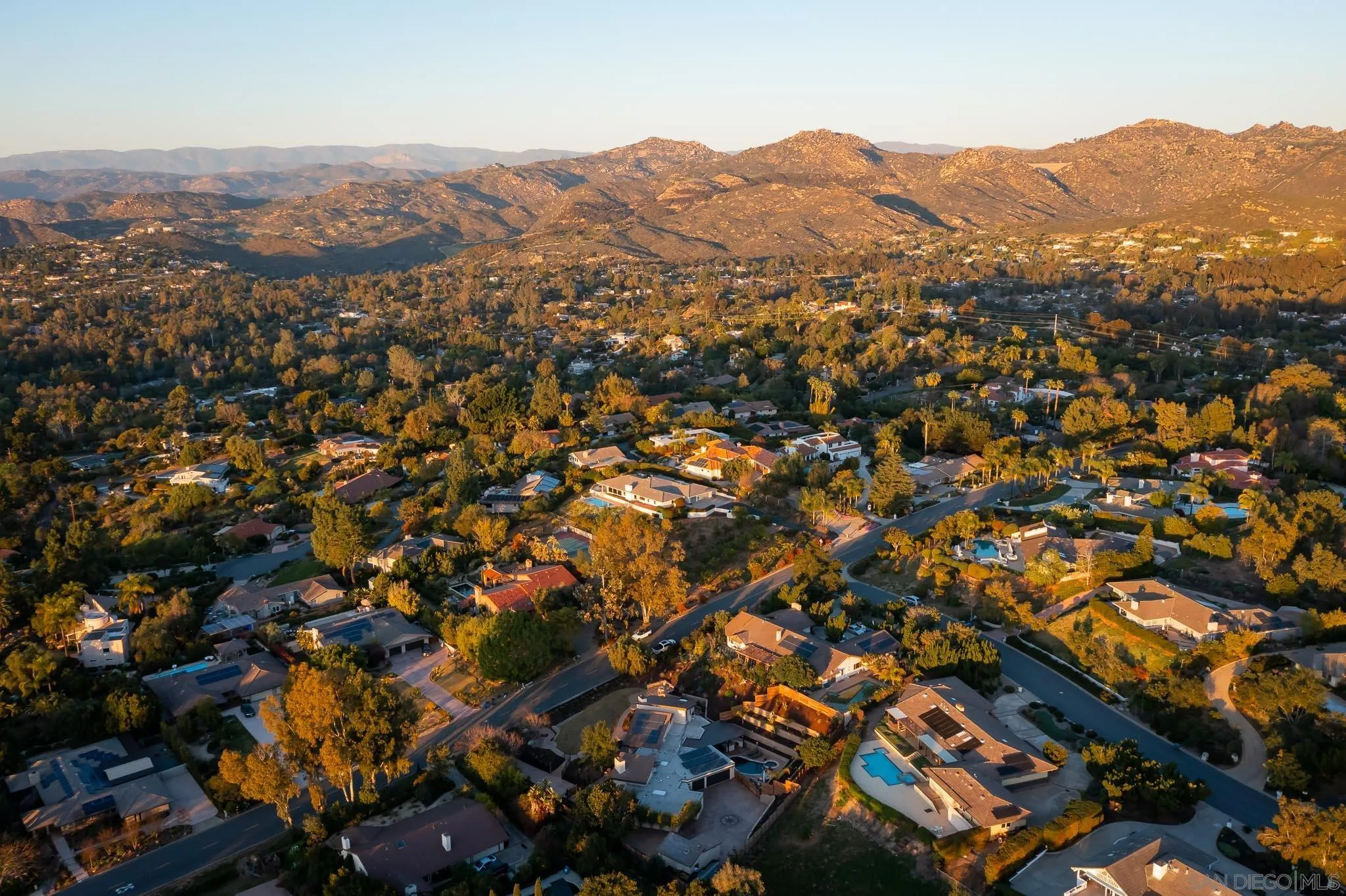13647 Orchard Gate Road Poway, CA 92064 - Photo 43 of 43 an aerial view of residential houses with outdoor space and trees