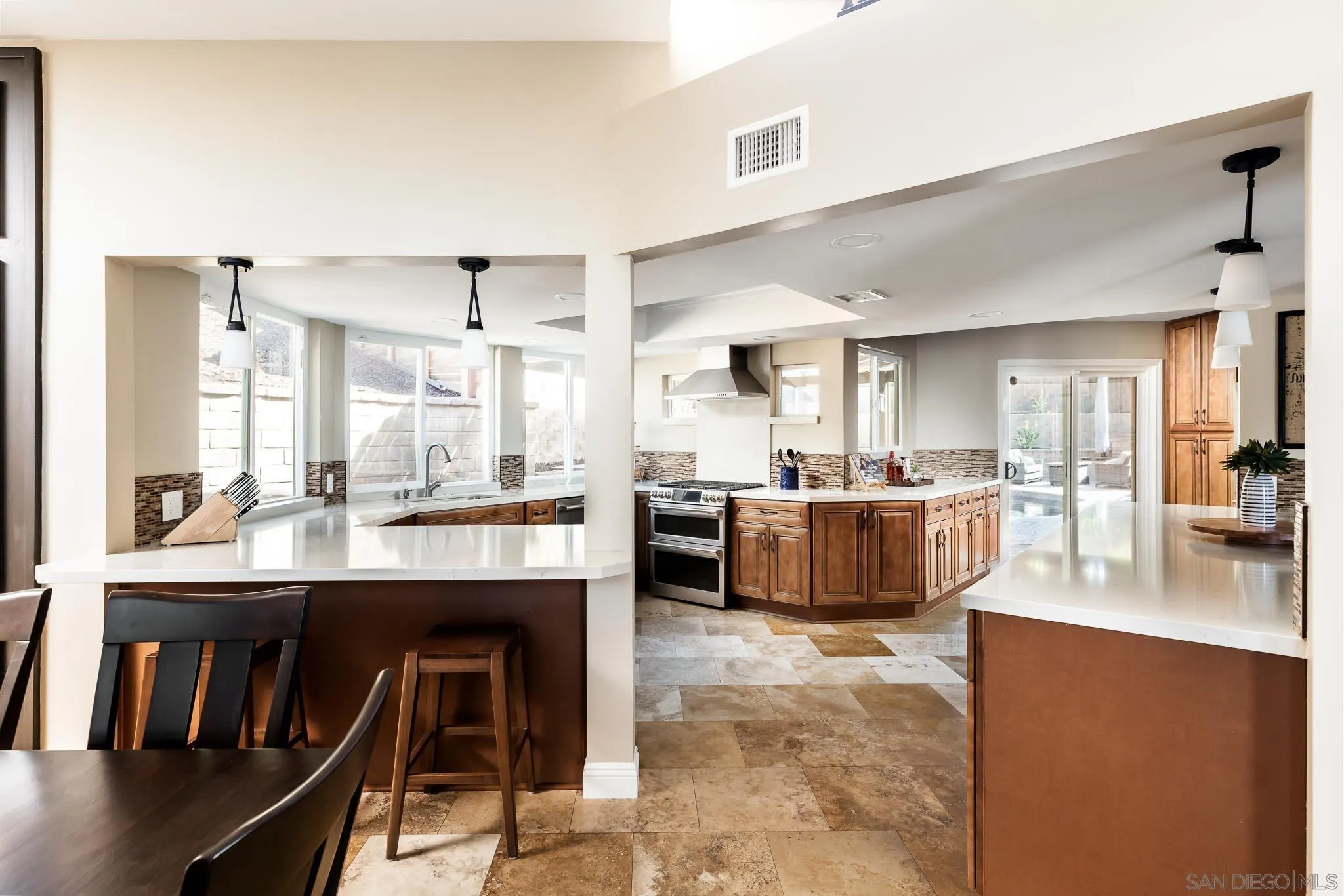 13647 Orchard Gate Road Poway, CA 92064 - Photo 8 of 43 a living room with stainless steel appliances kitchen island granite countertop furniture and a kitchen view
