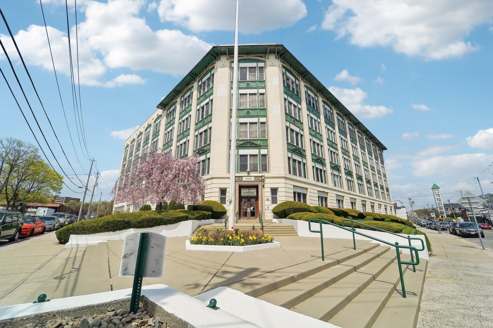 1 Landmark Square, Unit 607 Port Chester, NY 10573 - Photo 1 of 27 a front view of a building with sitting area