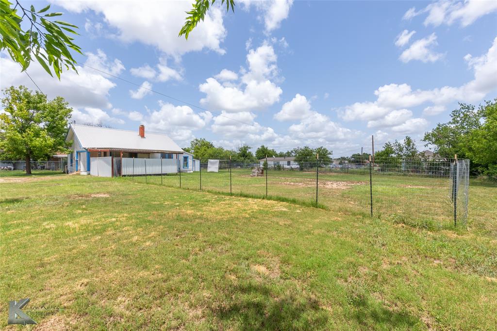 711 South Neches Street Coleman, TX 76834 - Photo 26 of 26 a view of a lake with a big yard
