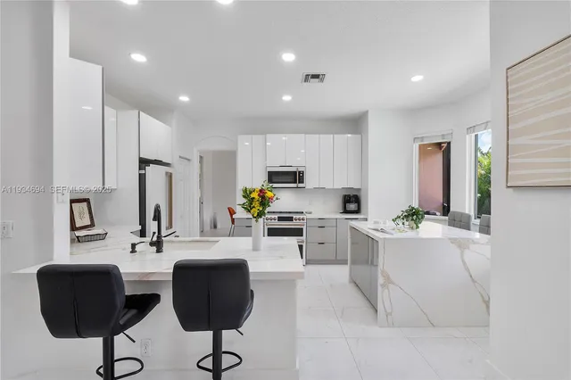 a bathroom with a toilet and shower