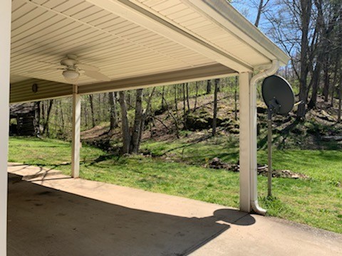 3979 Lem Davis Road Cunningham, TN 37052 - Photo 14 of 39 a backyard of a house with lots of green space
