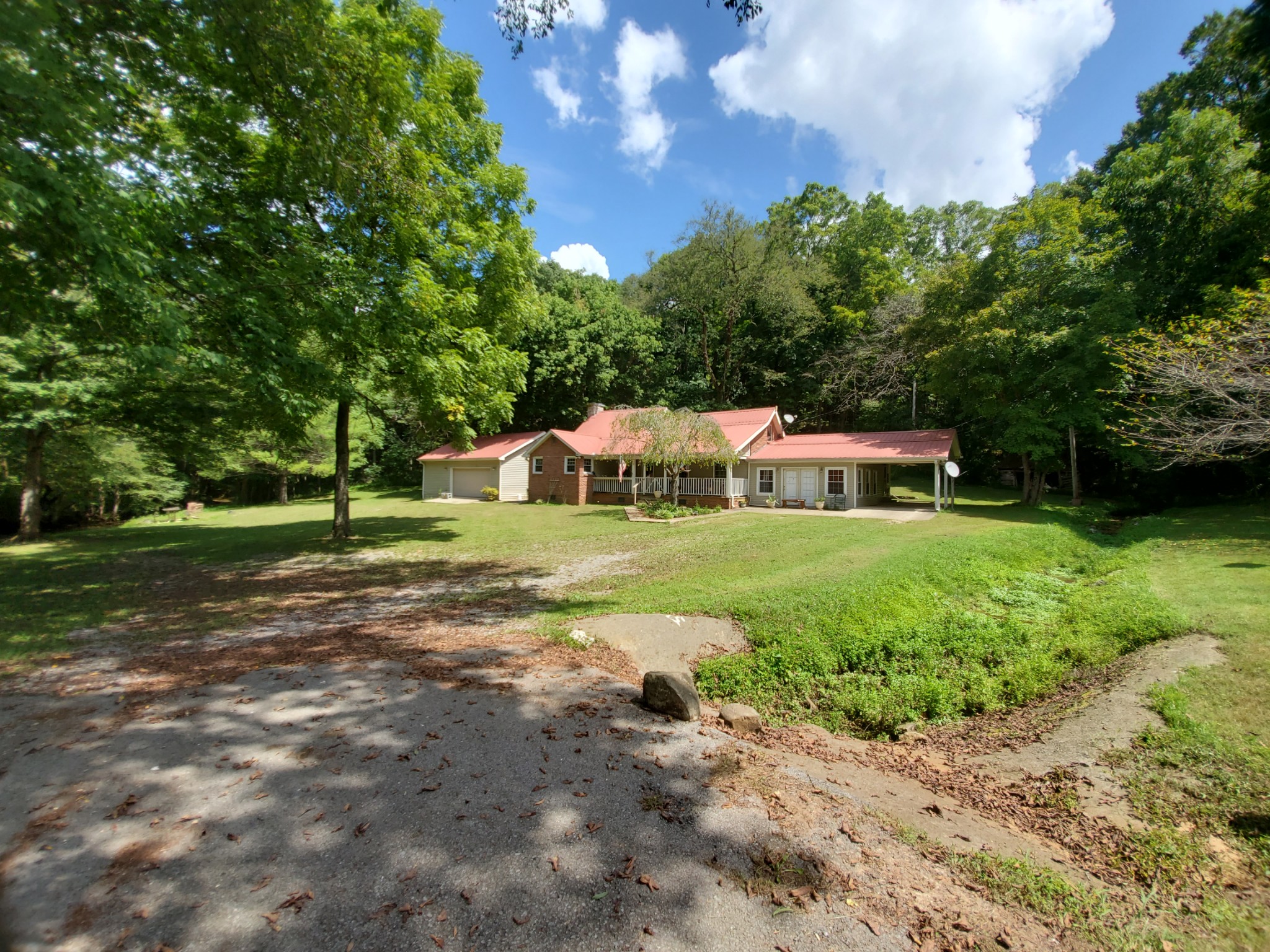 3979 Lem Davis Road Cunningham, TN 37052 - Photo 24 of 39 a view of a house with a yard