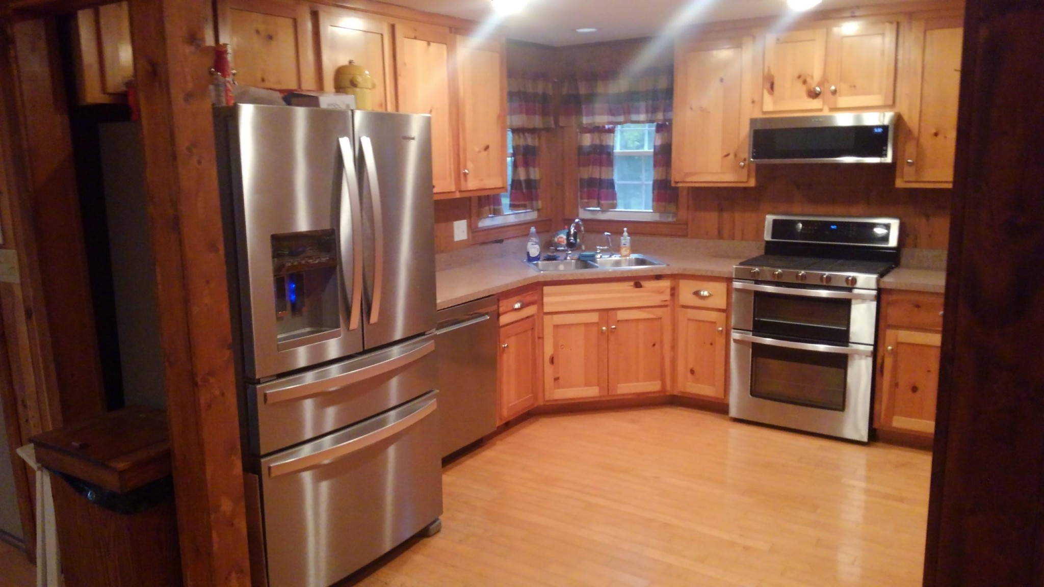 3979 Lem Davis Road Cunningham, TN 37052 - Photo 31 of 39 a kitchen with stainless steel appliances granite countertop a refrigerator a stove and a sink