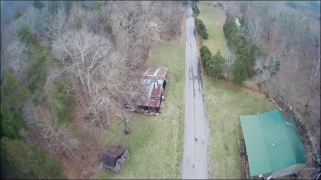 3979 Lem Davis Road Cunningham, TN 37052 - Photo 37 of 39 a aerial view of a house with a yard