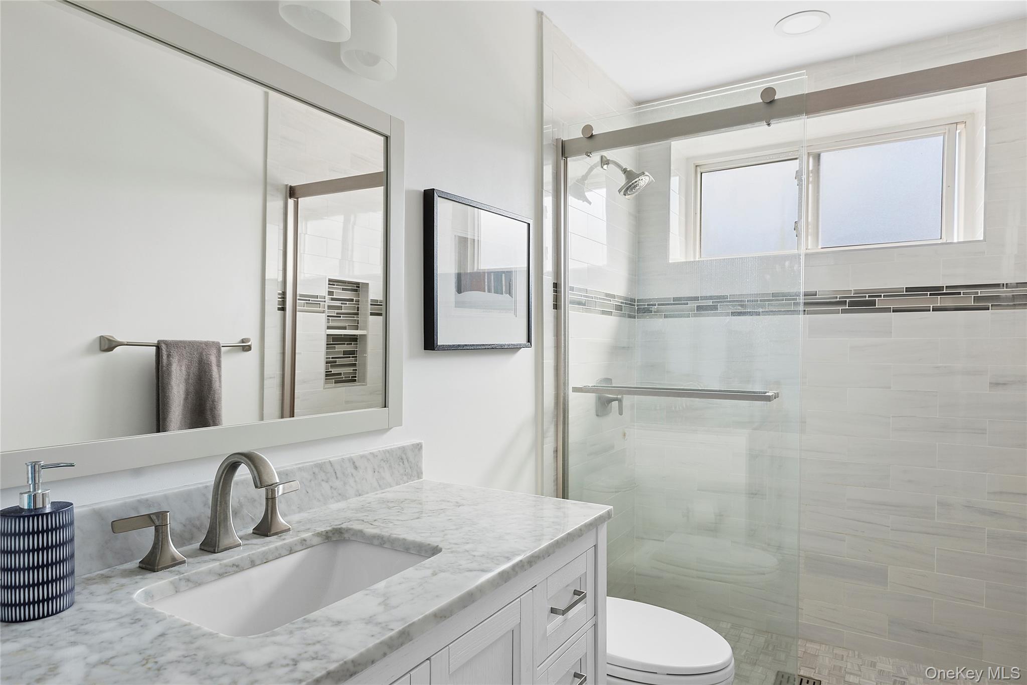21 Chapel Place, Unit 3M Great Neck, NY 11021 - Photo 10 of 21 Full bathroom featuring vanity and a stall shower