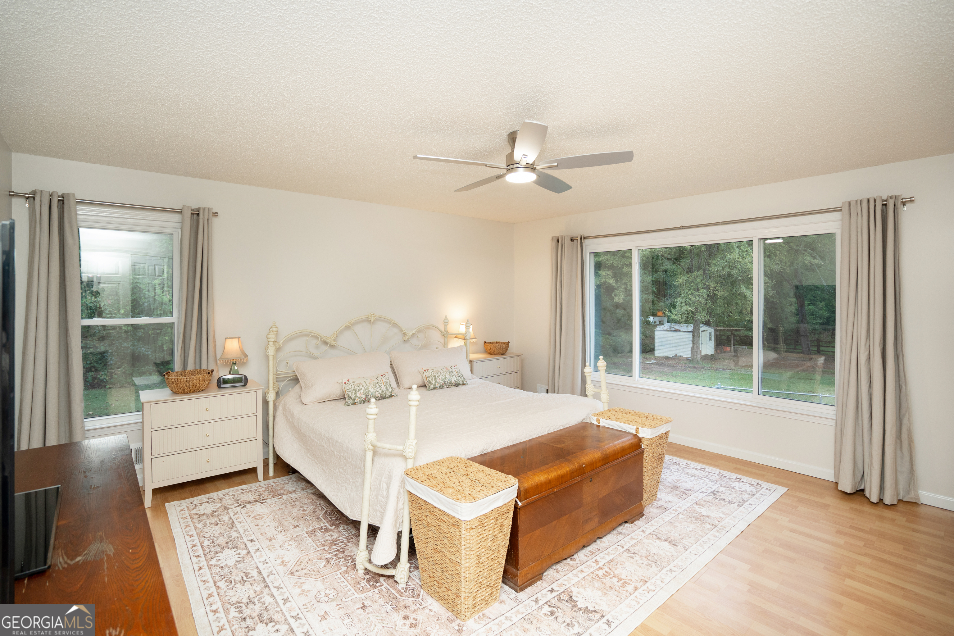 295 Hillview Road Hampton, GA 30228 - Photo 20 of 70 a bed room with a bed and a large window