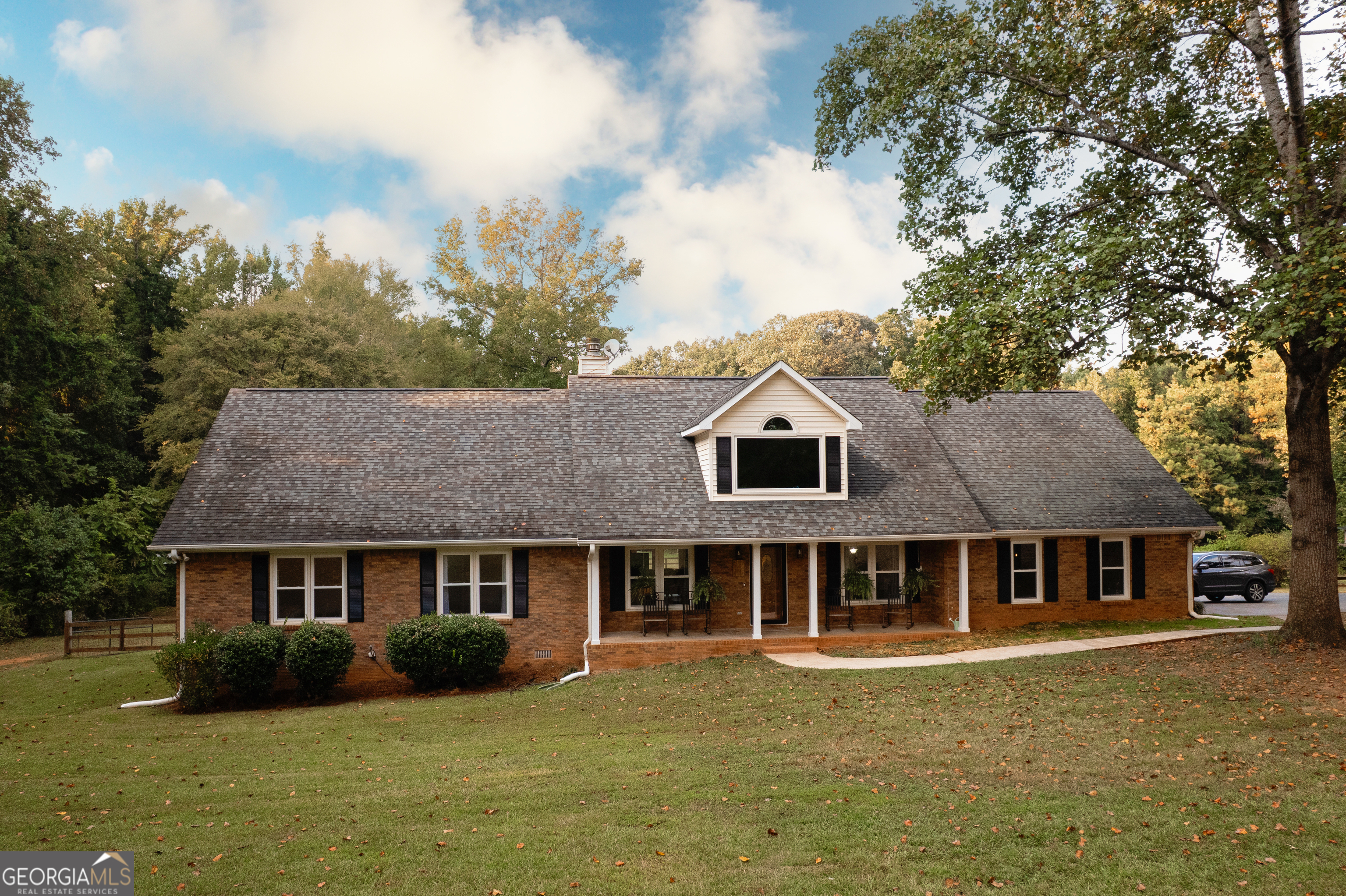 295 Hillview Road Hampton, GA 30228 - Photo 2 of 70 a aerial view of a house next to a big yard and large trees