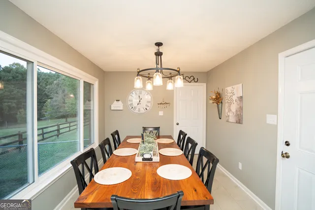 a view of a chairs and table on the deck