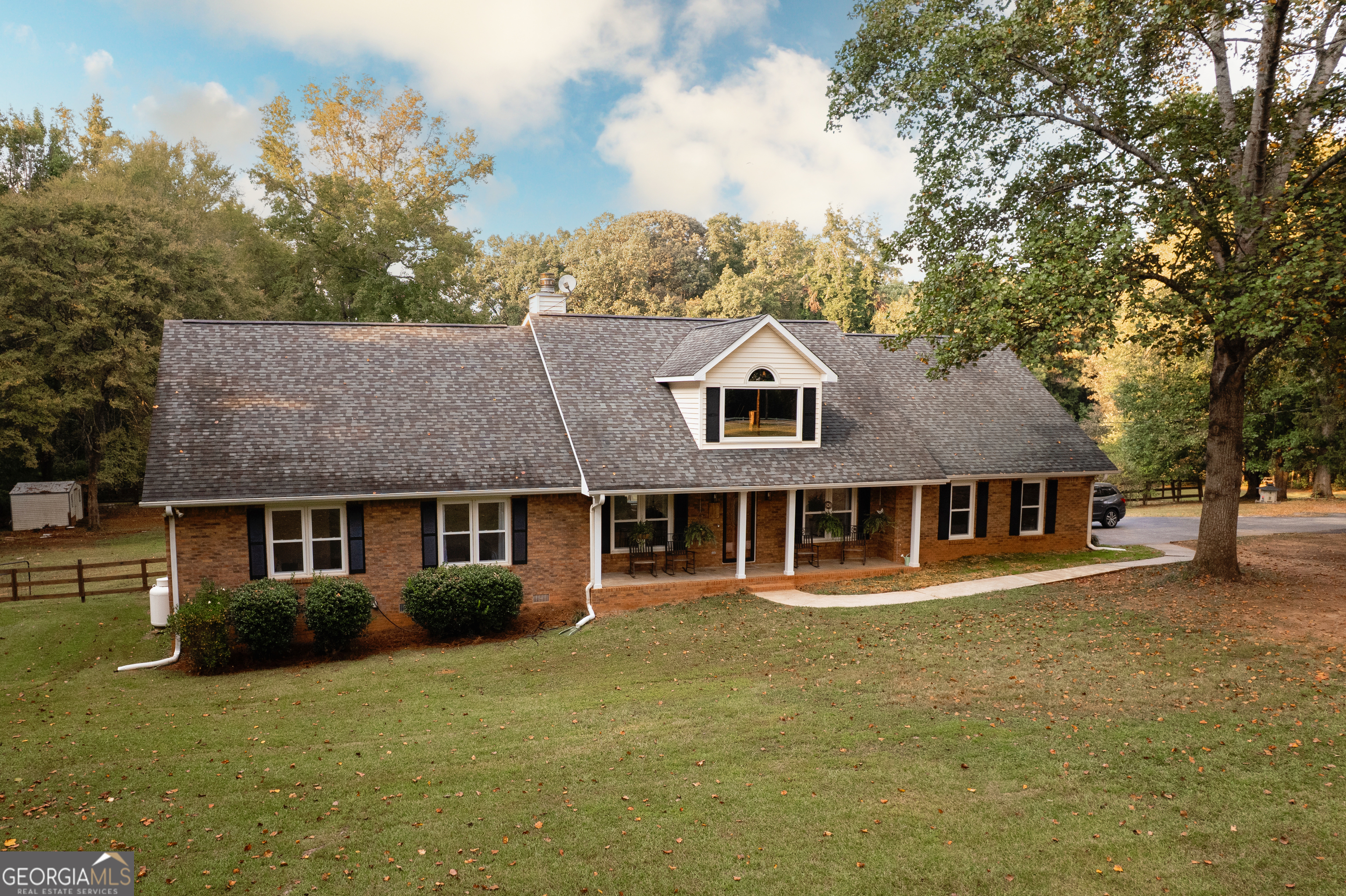 295 Hillview Road Hampton, GA 30228 - Photo 57 of 70 a front view of a house with a garden