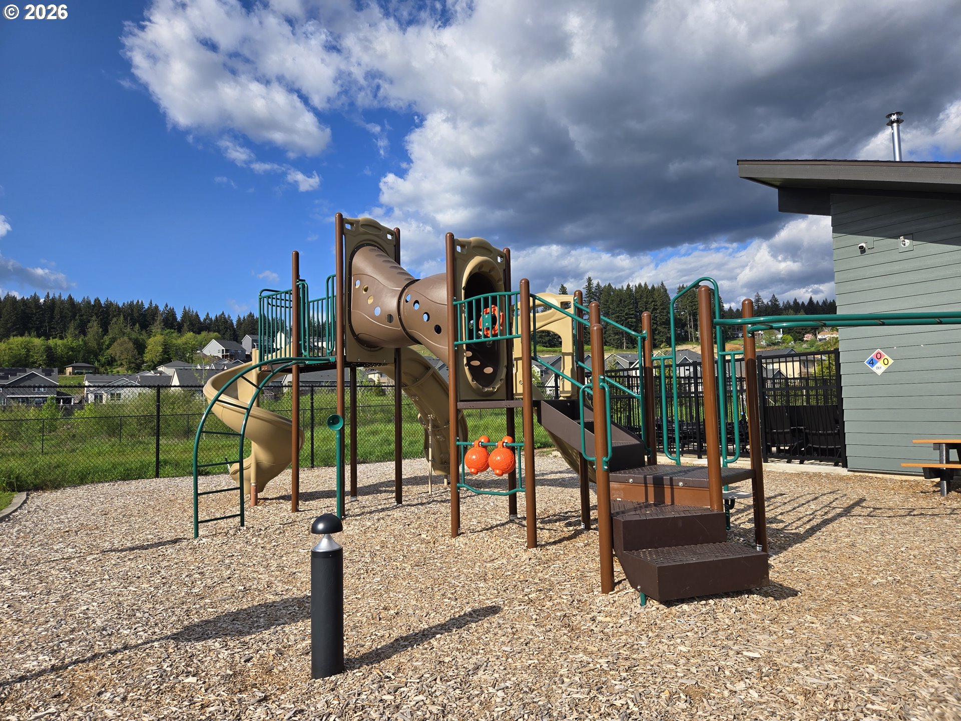 5788 North 86th Circle Camas, WA 98607 - Photo 26 of 26 a view of a park with swings and slides